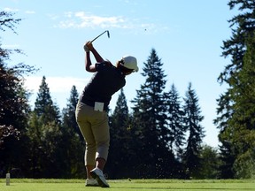 Lydia Ko of New Zealand hits a tee shot on the third hole during round three of the Canadian Women's Open at The Vancouver Golf Club on August 25, 2012 in Coquitlam, B.C. To help her through the current situation, reader Hélène Cleary pretends that her walks are a round of golf.