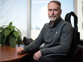 Gordon Asmundson, a psychology professor at the University of Regina, sits in his office at the university in Regina, Saskatchewan on Mar. 12, 2020. Asmundson has been researching the anxiety and fear around COVID-19.