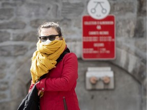 MONTREAL, QUE.: March 14, 2020 -- A woman leaves the COVID-19 test centre in the Hotel Dieu Hospital in Montreal, on Saturday, March 14, 2020. (Allen McInnis / MONTREAL GAZETTE) ORG XMIT: 64100
