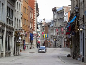 The sidewalks of Rue St-Paul in the heart of Old Montreal are empty Thursday March 19, 2020 due to the coronavirus COVID-19 crisis. Over in the Village, Tom Merrill says there is hardly a soul in sight.