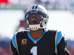 Cam Newton #1 of the Carolina Panthers reacts after throwing a 25-yard touchdown pass to Kelvin Benjamin in the fourth quarter of a game against the Tampa Bay Buccaneers at Raymond James Stadium on October 29, 2017 in Tampa, Florida. The Panthers defeated the Bucs 17-3.