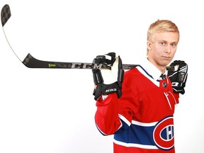 Forward Jesse Ylonen poses for photo after being selected by the Canadiens in the second round (35th overall) of NHL Draft on June 23, 2018 in Dallas.