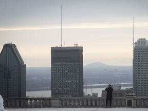 Looking at the Montreal skyline from the Mount Royal lookout on Thursday March 19, 2020.
