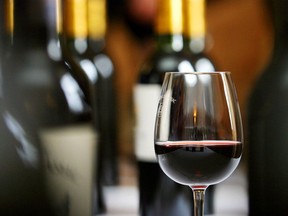 (FILES) In this file photo taken on March 05, 2004 A glass of Bordeaux red wine classified "crus bourgeois"  is pictured in a Bordeaux castle in Ludon-Médoc, during a tasting session. (Photo by Patrick BERNARD / AFP)