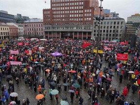 People gather in central Oslo to celebrate the International Women's Day on March 8, 2020.