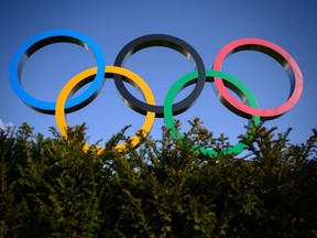 The Olympic Rings are pictured next to the headquarters of the International Olympic Committee (IOC) in Lausanne on Saturday, March 21, 2020, as doubts increase over whether Tokyo can safely host the summer Games amid the spread of the COVID-19.