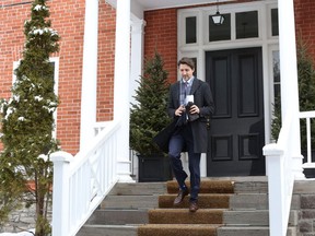 Canadian Prime Minister Justin Trudeau exit his residence to attend a news conference on COVID-19 situation March 24, 2020 in Ottawa, Canada. (Photo by Dave Chan / AFP)