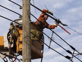 Hydro-Québec crews repair power lines.