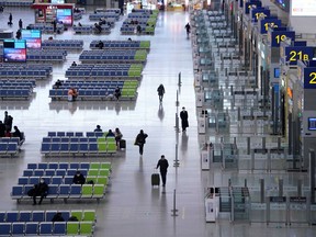 Travellers are seen at the Shanghai Hongqiao Railway Station on the last day of the Spring Festival travel rush, as the country is hit by an outbreak of the novel coronavirus, in Shanghai, China February 18, 2020.  REUTERS/Aly Song