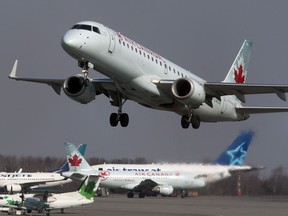 An Air Canada jet takes off from Halifax Stanfield International Airport in Enfield, N.S. on Thursday, March 8, 2012. A union official says Air Canada is laying off more than 5,000 flight attendants as the country's largest airline cuts routes and parks planes due to COVID-19.