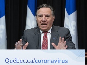 Quebec Premier François Legault responds to questions during his daily news conference on the COVID-19 pandemic on Friday, March 20, 2020, at the legislature in Quebec City.