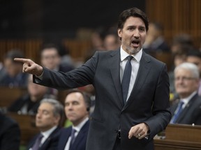 Prime Minister Justin Trudeau gestures as he responds to a question during Question Period in the House of Commons Wednesday March 11, 2020 in Ottawa.
