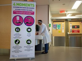 Adila Zahir, chief of infection prevention and control, washes her hands during a media tour of quarantine facilities for treating novel coronavirus at the Jewish General Hospital in Montreal on March 2, 2020.