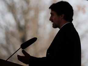 Canada's Prime Minister Justin Trudeau speaks to news media outside his home in Ottawa, Ontario, Canada March 25, 2020.  REUTERS/Patrick Doyle