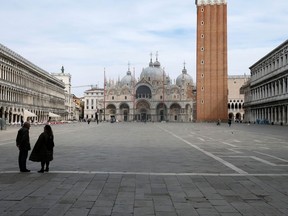 The almost empty St. Mark's Square is seen after the Italian government imposed a virtual lockdown on the north of Italy including Venice to try to contain a coronavirus outbreak, in Venice, Italy, March 9, 2020.