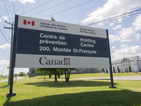 Photo of sign outside a Canada Border Services Agency Immigrant Holding Centre in Laval, taken on Aug. 15, 2016.
