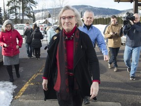 Minister of Crown-Indigenous Relations Carolyn Bennett and B.C. Indigenous Relations Minister Scott Fraser walk away after addressing the media in Smithers, B.C., Saturday, February 29, 2020.