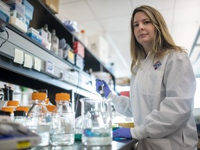 Alyson Kelvin, who is working on different coronavirus solutions, stands for a photo at her University of Saskatchewan lab inside VIDO-InterVac in Saskatoon, Friday, March 13, 2020.