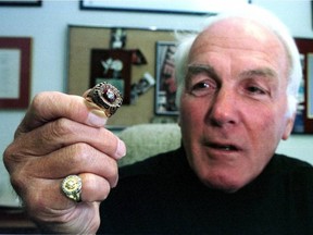In March 2000, Henri Richard showed off one of the 11 Stanley Cup rings he won during his 20-year career with the Canadiens.