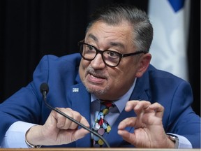Horacio Arruda, Quebec director of National Public Health, responds to reporters' questions at the daily news conference on the COVID-19 pandemic, Friday, March 20, 2020 at the legislature in Quebec City.