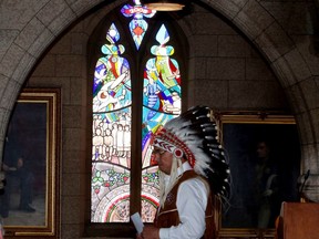 Chief Wilton Littlechild, a Commissioner of the Truth and Reconciliation Committee, stands in front of stained a glass window in House of Commons foyer, during a dedication ceremony commemorating the legacy of former Indian Residential school students and their families on Parliament Hill in Ottawa, Monday November 26, 2012. "Misconceptions and misinterpretations of 'paganism' were used as justifications for historical injustices aimed at dominating and erasing those Indigenous beliefs and practices, including through government-backed and church-managed residential schools," Ehaab D. Abdou writes.
