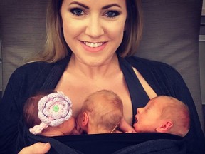 A mom of triplets uses the Joeyband, a baby item created by two Canadian women entrepreneurs. (Photo courtesy of @trippingovertriplets)