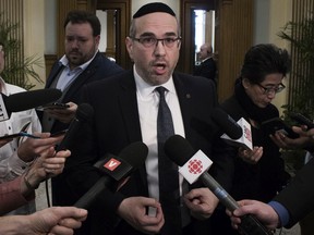Lionel Perez, city councillor and head of the official opposition, speaks with media at Montreal’s City Hall of Jan. 27, 2020.