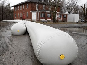 Anti-flooding equipment has been set up on Gouin Blvd. With social distancing protocols in effect, assembling armies of volunteers for sandbagging duties will not be feasible this year, Pierrefonds-Roxboro Mayor Jim Beis says.