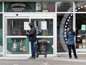 In March 2020, people lined up just before opening hours at the Atwater SAQ.