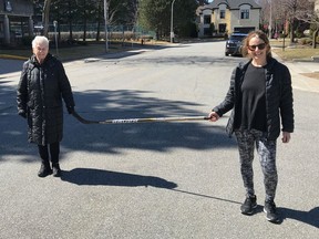 A different kind of street hockey. Gilda Rubin, 87, and Liana Rubin practise social distancing on Armstrong Ave. in Côte-St-Luc.
