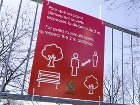 The city of Dorval posted signs in parks warning of potential closure if people don't respect social distancing guidelines, April 7, 2020.