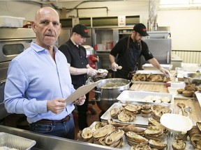 Lenny Lighter oversees the making of meals at Moishes to be delivered to the Old Brewery Mission.