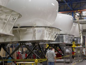 A view of full-flight simulators inside the CAE plant at the headquarters of the company in the St. Laurent area of Montreal Wednesday, May 6, 2015. The company makes full-flight and healthcare simulators.