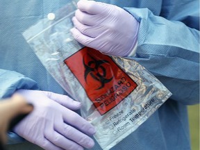 A close-up view of a health care specimen bag at a coronavirus testing site.