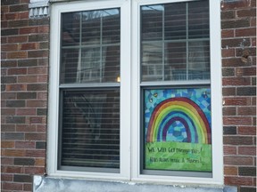 Children's drawings of rainbows have been popping up in many ares of Montreal after schools were ordered closed as a result of the Cornonavirus in Montreal, on Friday, March 20, 2020. (Allen McInnis / MONTREAL GAZETTE) ORG XMIT: 64130