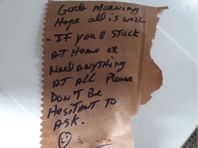 A Gazette carrier left a note offering help along with the morning paper at a home in Pierrefonds during the COVID-19 crisis. Photo courtesy of Debbie Brown