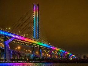 Typically the new Samuel de Champlain Bridge is lit at night in blue and green, except for a one-hour period on every Sunday in April. Dave Sidaway / Montreal Gazette