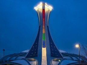 Montreal's Olympic Stadium lit its tower spine in the rainbow colours April 27, 2020.