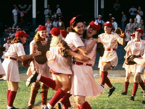 The Rockford Peaches celebrate a big win in A League of Their Own, a fictional story about a real league.