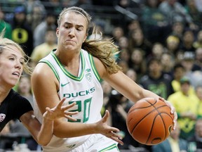 Oregon Ducks guard Sabrina Ionescu (20) drives to the basket at Matthew Knight Arena on Jan. 16, 2020.