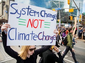 People take part in a climate change strike in Toronto on Sept. 27, 2019.