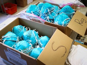 Boxes of N95 protective masks for use by medical field personnel are seen at a New York State emergency operations incident command centre during the coronavirus outbreak in New Rochelle, N.Y., on March 17, 2020.