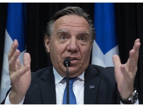 Quebec Premier François Legault responds to question during a news conference on the COVID-19 pandemic on April 2, 2020 at the legislature in Quebec City.