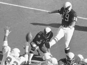 In this Nov. 22, 1971, file photo, Philadelphia Eagles' Tom Dempsey kicks a point after a touchdown on his way to 13 points, during an NFL football game against the St. Louis Cardinals in St. Louis, Mo.