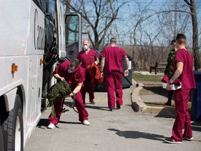 A bus carrying Canadian Armed Forces medical personnel arrives at Villa Val des Arbres, a seniors' long-term care centre, to help amid the outbreak of the coronavirus disease (COVID-19), in Montreal, Quebec, Canada April 20, 2020.