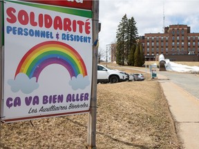 A sign shows support to residents outside CHSLD Laflèche, a seniors' residence in Shawinigan, April 14, 2020.