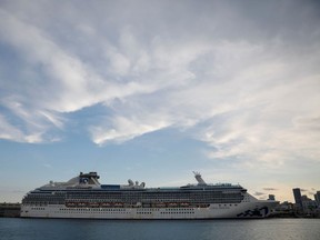 A view of the Coral Princess ship, of Princess Cruises fleet, with patients affected by coronavirus disease (COVID-19), as it docks at Miami Port, in Miami, Florida, U.S., April 4, 2020. REUTERS/Marco Bello