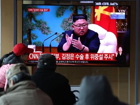 People watch a television broadcast reporting on North Korean Kim Jong-un at the Seoul Railway Station on April 21, 2020 in Seoul, South Korea. South Korea has seen no unusual signs with regard to North Korean leader Kim Jong-un's health, a government source said Tuesday, after US media reported that Kim is "in grave danger after a surgery."