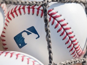 A baseball with MLB logo is seen at Citizens Bank Park before a game between the Washington Nationals and Philadelphia Phillies on June 28, 2018, in Philadelphia.