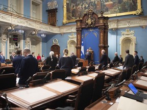 A half-empty National Assembly sits to pass a few motions before closing March 17, 2020, at the legislature in Quebec City.